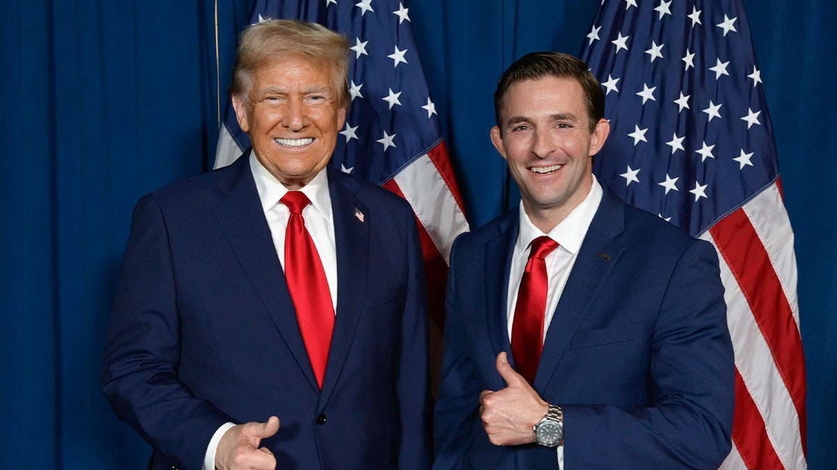 President Donald Trump standing beside Georgia Rep. David Clark