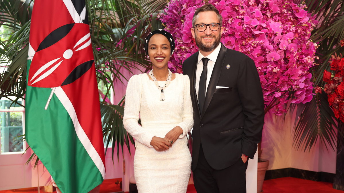 Representative Ilhan Omar, a Democrat from Minnesota, and her husband Tim Mynett arrive to attend a state dinner in honor of Kenya's president William Ruto at the White House.