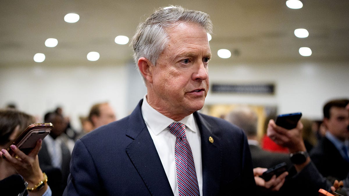Sen. Roger Marshall, R-Kan., speaks to reporters in the Senate subway