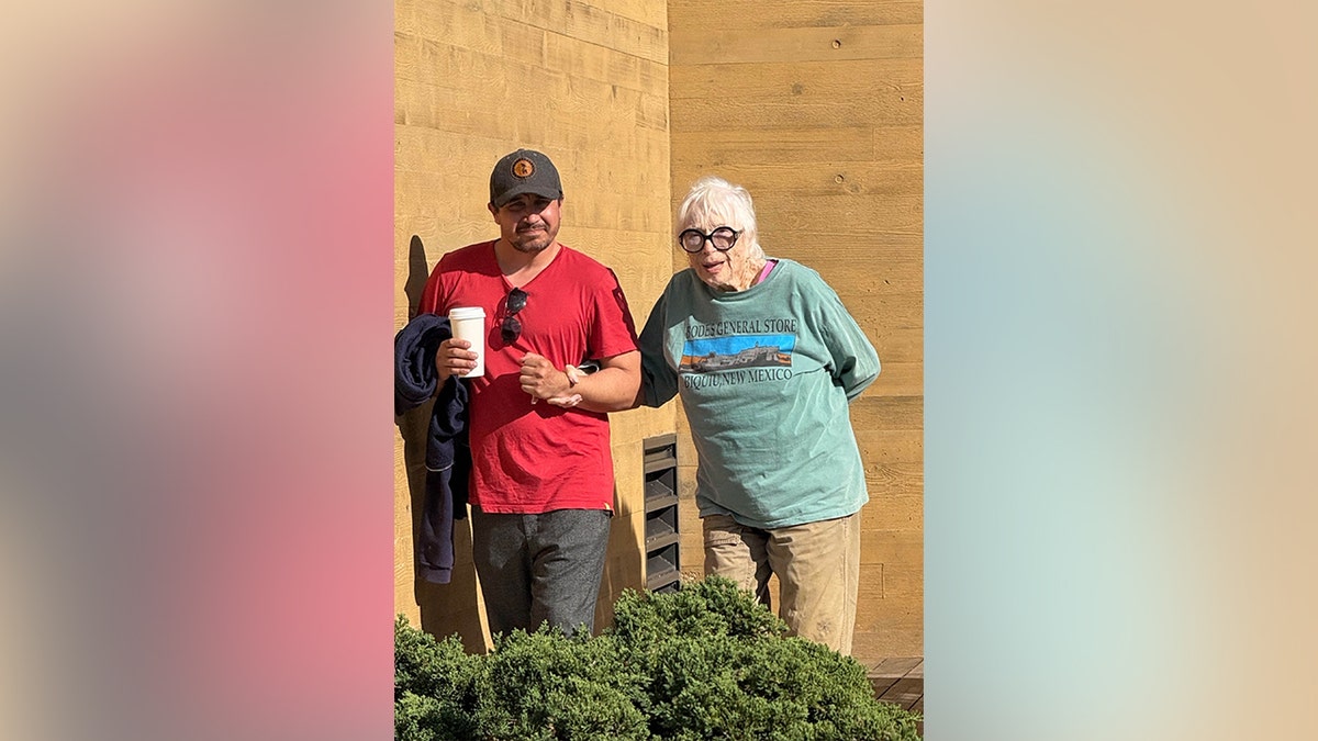 Shirley MacLaine and a male companion walking out of Nobu in Malibu in January 2026.