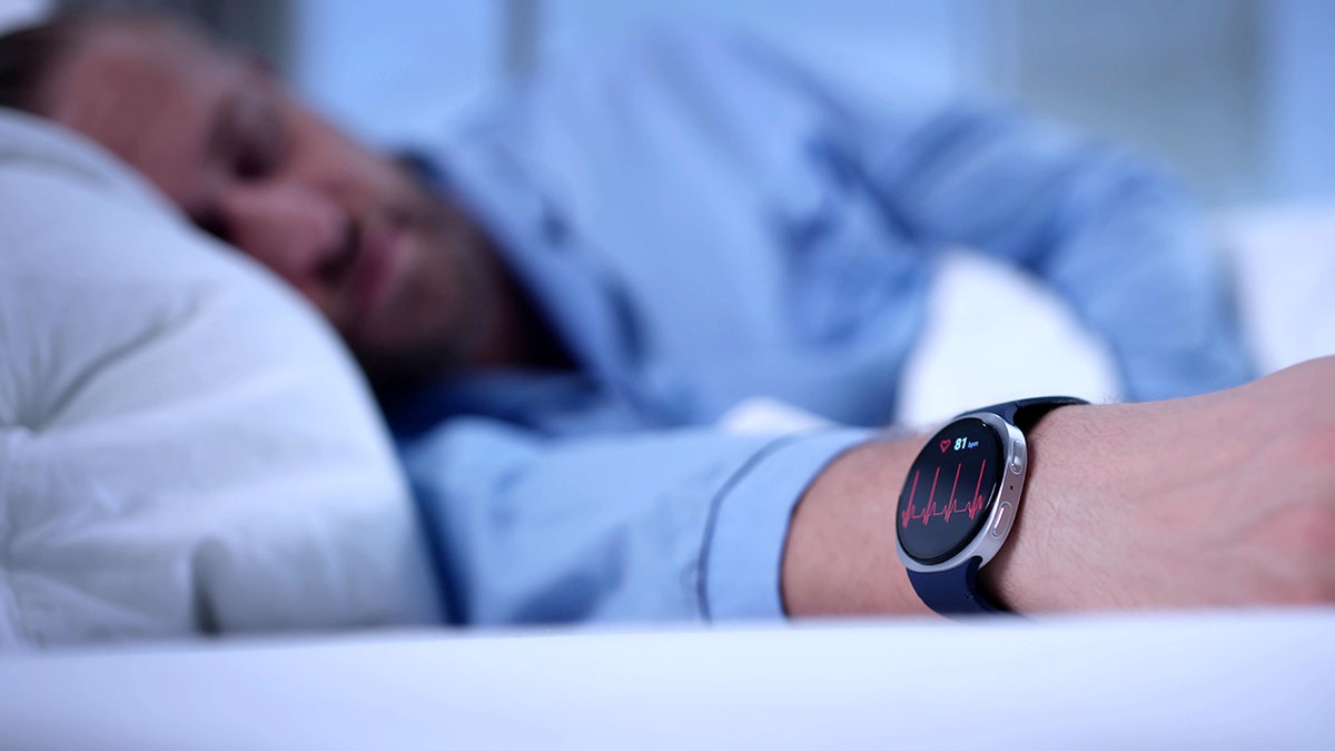 Man sleeps while wearing smartwatch