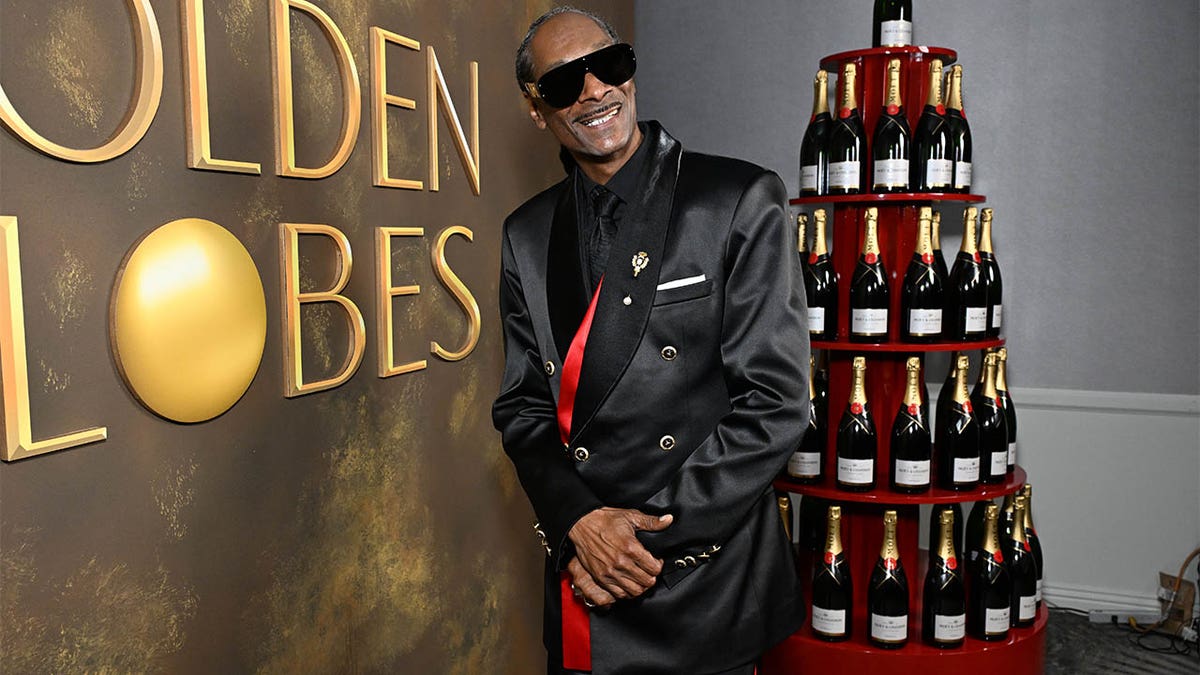 Snoop Dogg smiles backstage at Golden Globes