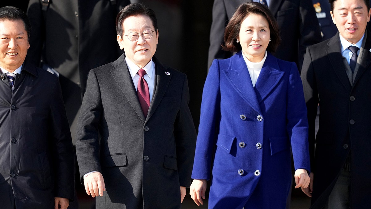 South Korean President Lee Jae Myung walking with wife, Kim Hea Kyung