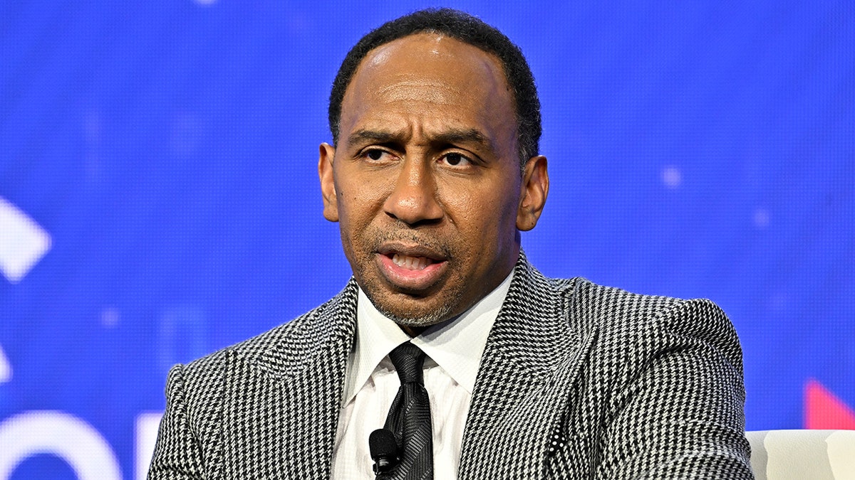 Stephen A. Smith celebrates