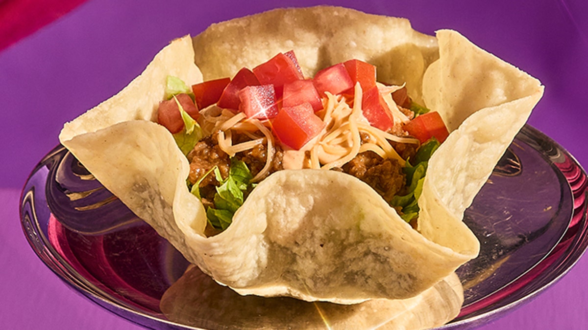 Taco Bell's new mini taco salad seen in promotional pic.
