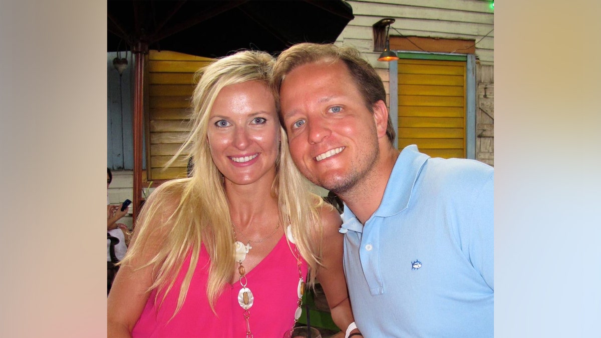 Tara and Kurt Arnold smile