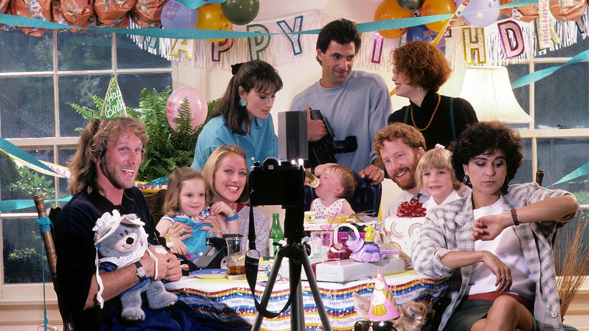 Cast of Thirtysomething birthday party scene.