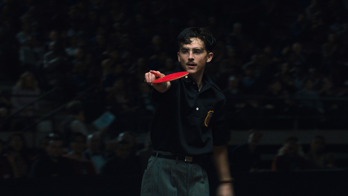 Timothee Chalamet playing ping pong in "Marty Supreme"