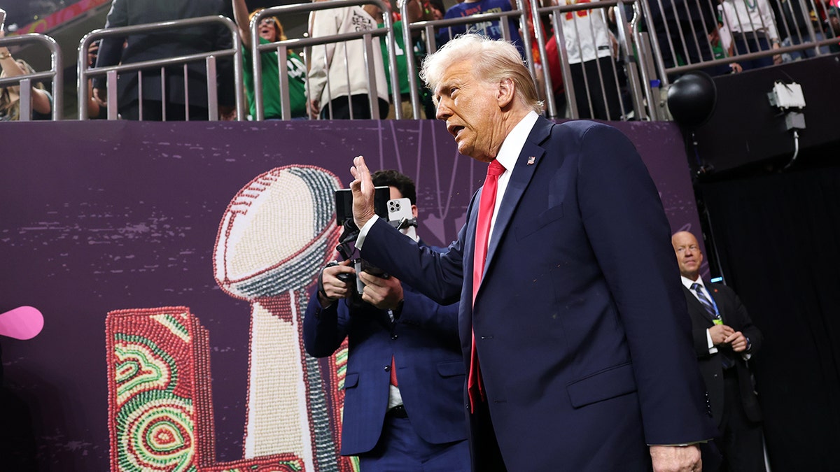Trump waving at last year's Super Bowl