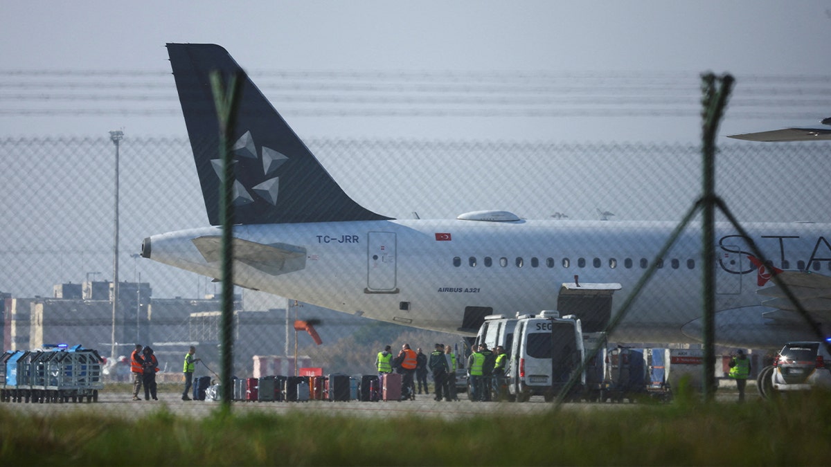 passenger luggages seen outside of plane