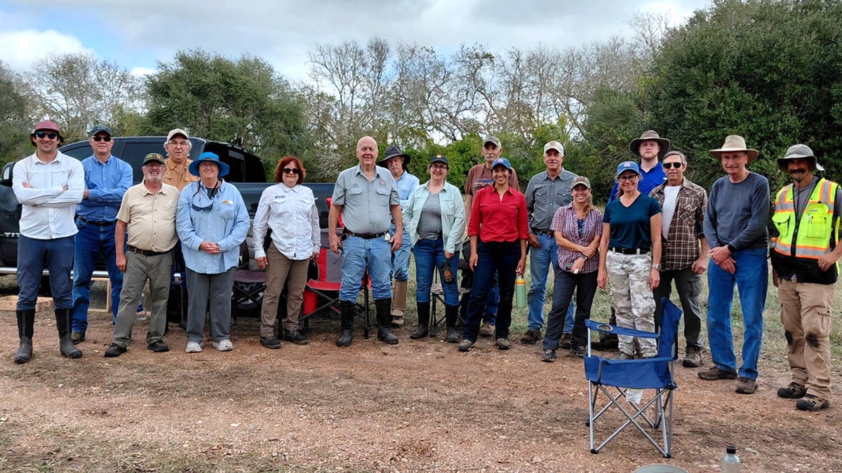 Group picture of archaeologists smiling