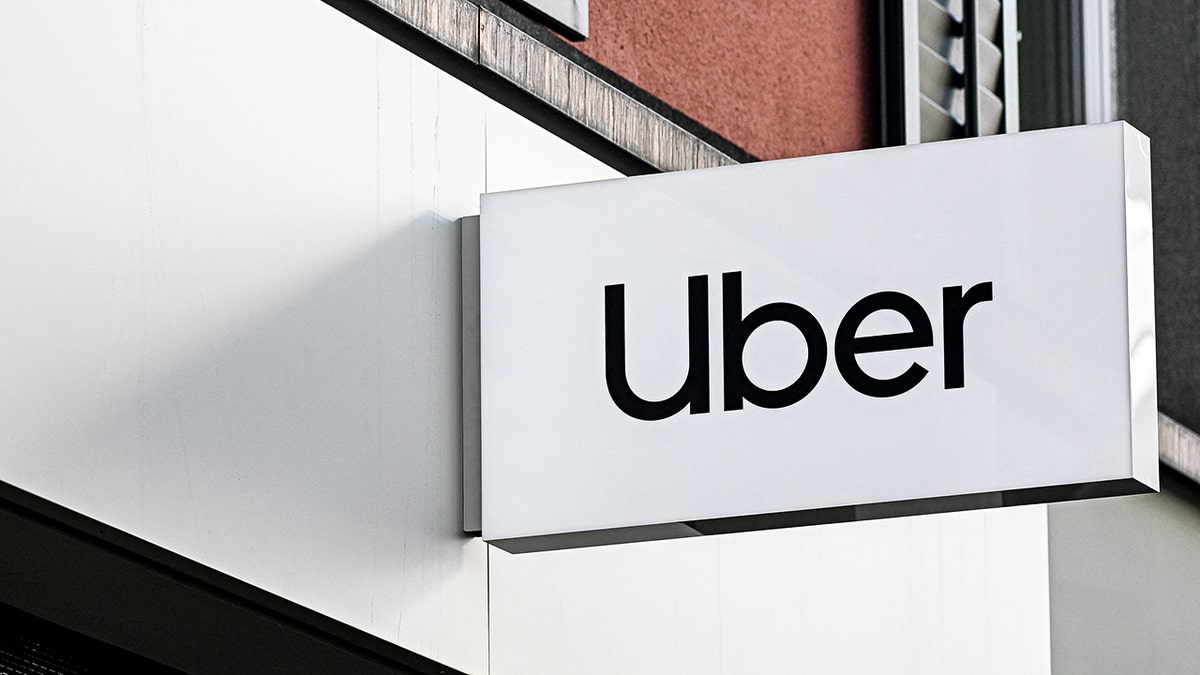 Uber sign outside of a building.