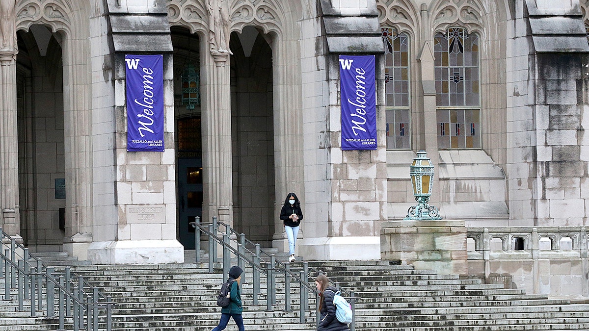 Mara Maughan standing outdoors on the University of Washington campus