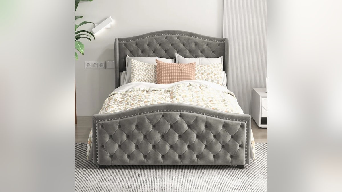 Store blankets, pillows and clothing under this bed.