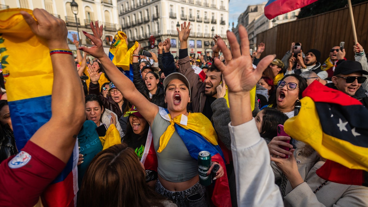 Protesters in Madrid celebrate Maduro's capture