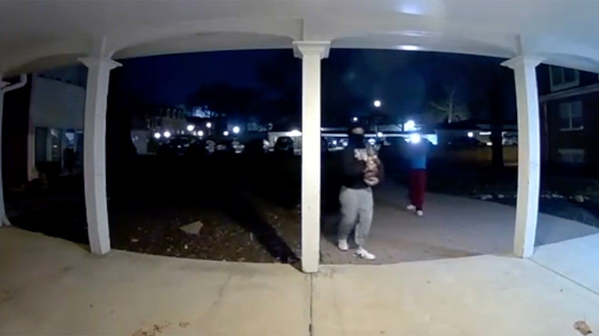 Surveillance footage shows teens partaking in the viral "Door Kick Challenge"