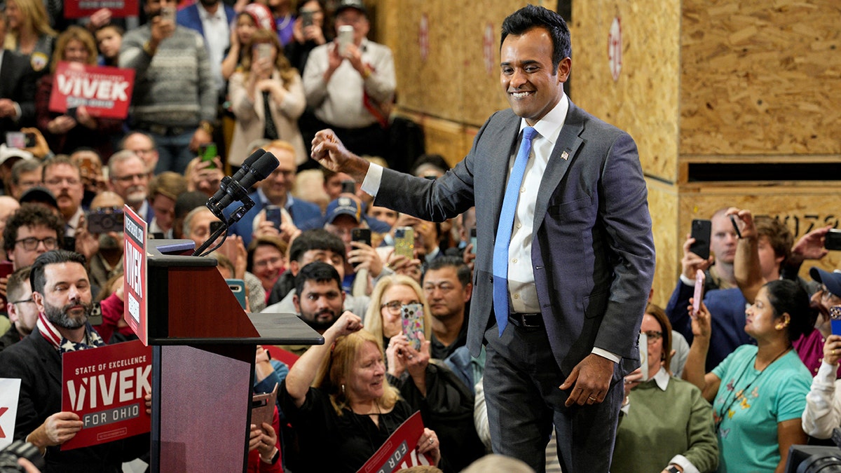 Vivek Ramaswamy gestures during campaign event