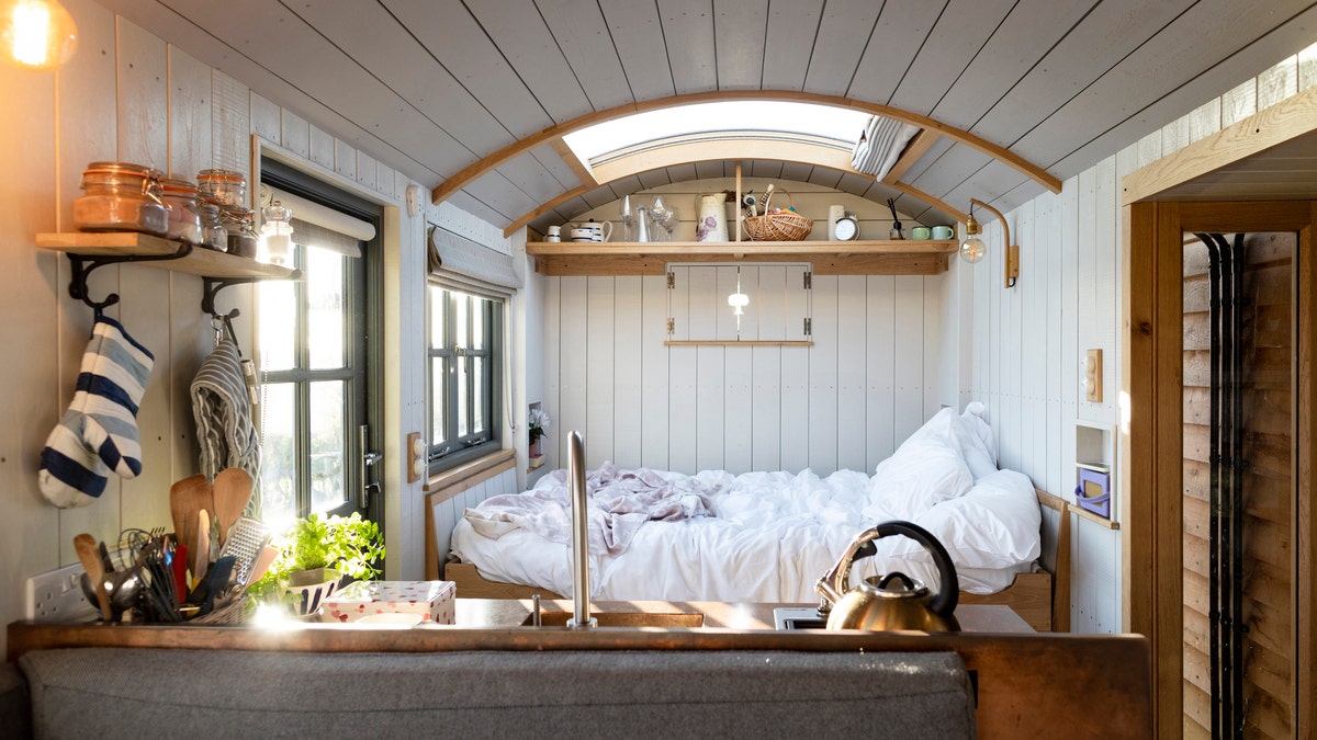 Live small and save money with a tiny house. 