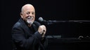 Billy Joel makes surprise comeback performance after brain condition forced show cancellations