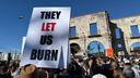 ‘They let us burn’: Palisades Fire victims protest leadership one year after catastrophic wildfires