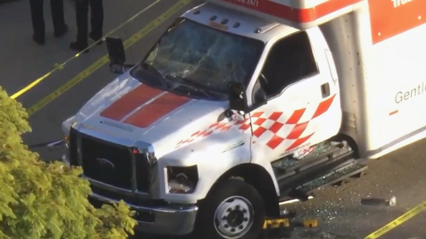 Driver appears to ram U-Haul truck through crowd during Iran protest in Los Angeles