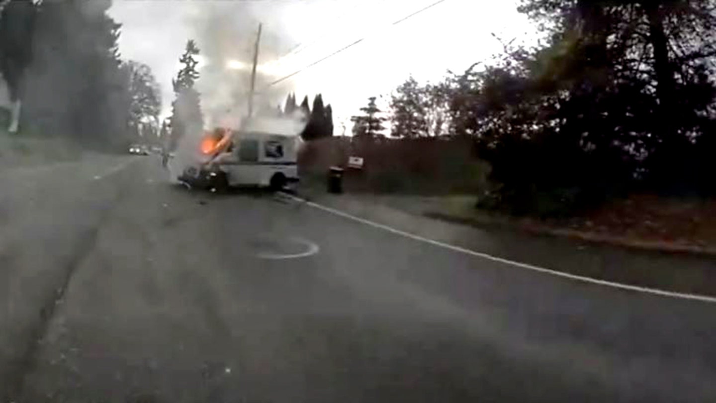 Image: The deputy pulled the mail truck driver away from the burning vehicle. (Pierce County Sheriff's Office)