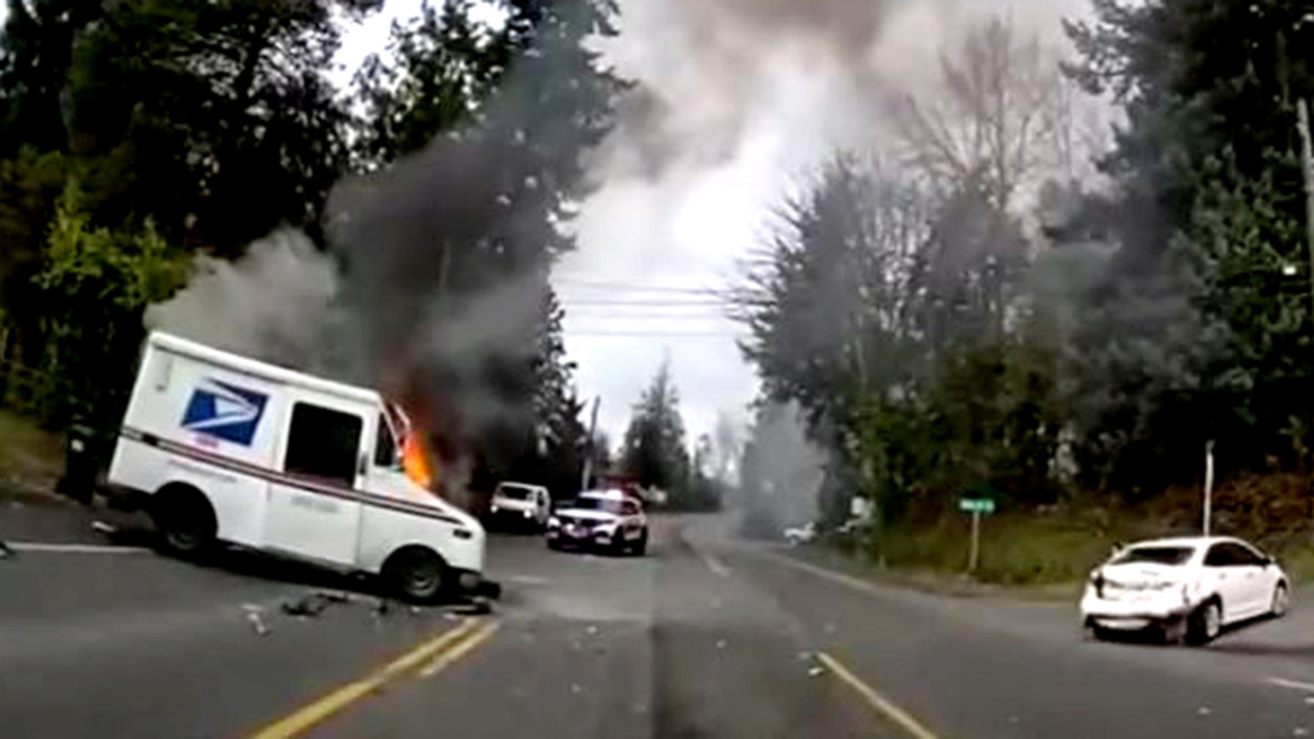 Image: The driver of the mail truck and a passenger in the sedan suffered serious injuries, officials said. (Pierce County Sheriff's Office)