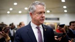 Sen. Roger Marshall, R-Kan., speaks to reporters in the Senate subway
