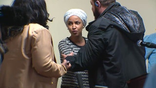 Ilhan Omar sprayed by unknown substance after man charges her at Minneapolis town hall