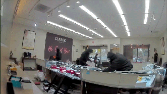 Brazen daylight robbery caught on camera leaves jewelry store owner fearing worst