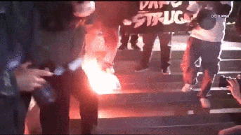 Leftist agitators desecrate American flag during anti-ICE, anti-police demonstration - Fox News