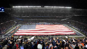 NFL players stunned by 'Star-Spangled Banner' at Bears-Rams playoff game - Fox News