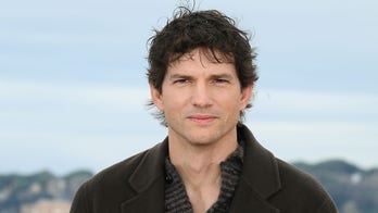 Ashton Kutcher sets record straight on rumors he and wife Mila Kunis don't shower