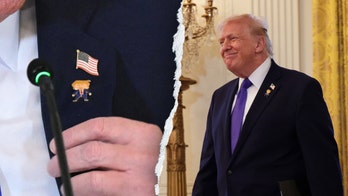 Trump wears 'happy Trump' pin alongside American flag during White House oil executive meeting