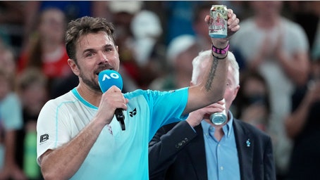 Three-time Grand Slam winner enjoys beer on court after emotional final Australian Open match