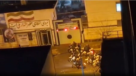 Armed Iranian protesters battle police in Tehran streets as Trump warns of forceful US response