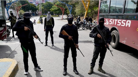 US warns Americans to leave Venezuela immediately as armed militias set up roadblocks