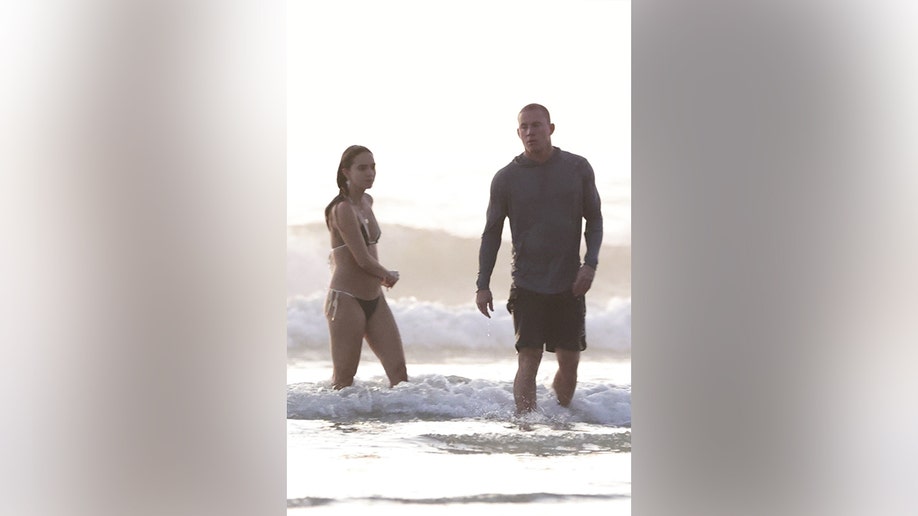 Tatum and Williams getting out of the water following their swim.