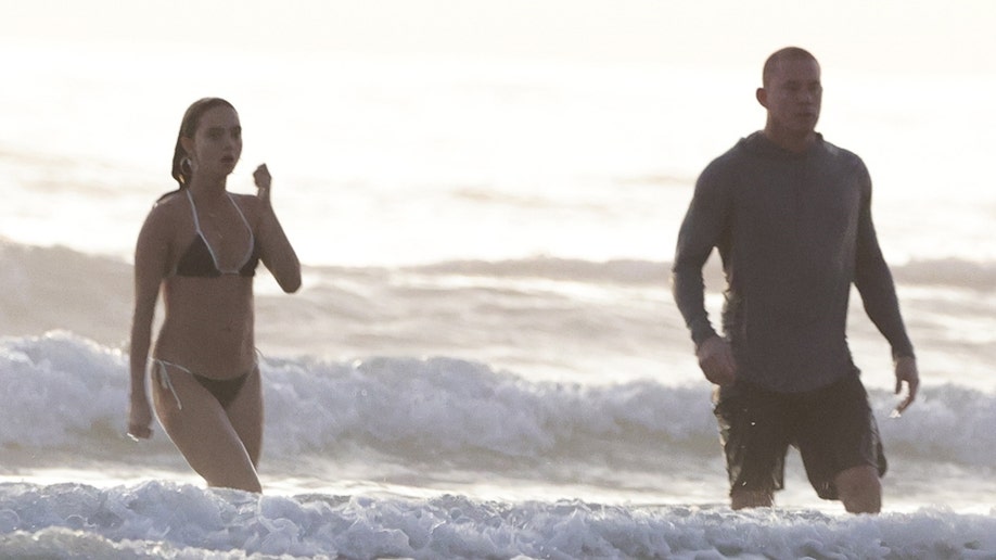 Channing Tatum and Inka Williams coming out of the water after swimming in Costa Rica.