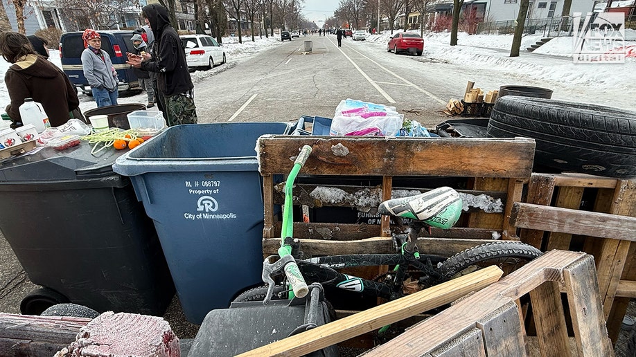 Location of ICE shooting barricaded by residents in Minneapolis