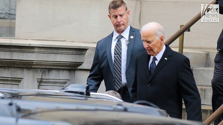 Biden with Secret Service at Tatiana Schlossberg's funeral.