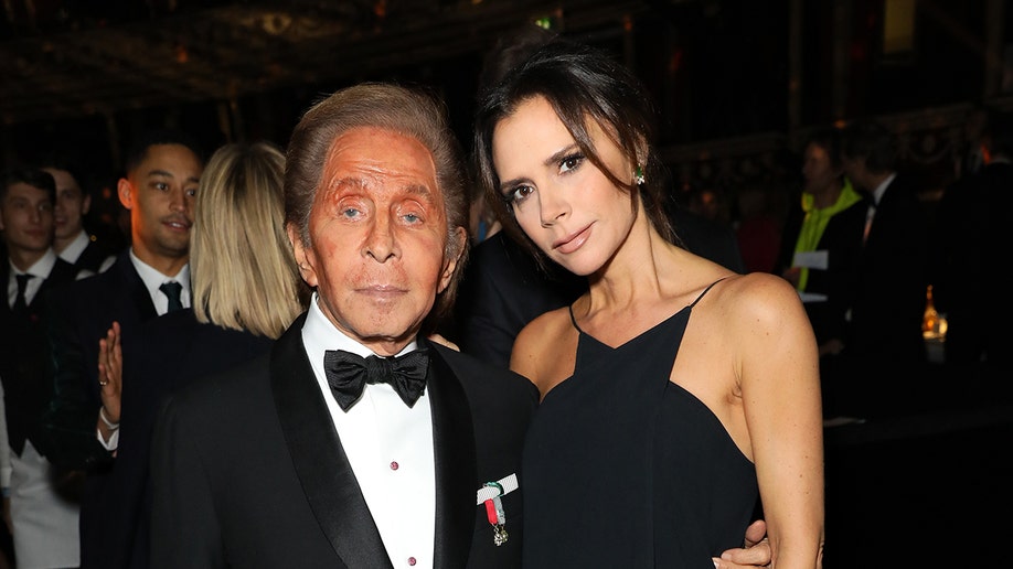 Valentino Garavani and Victoria Beckham attend The Fashion Awards at Royal Albert Hall in London on Dec. 10, 2018.