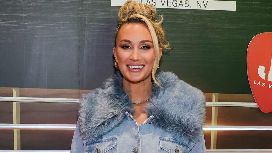 Brittany Aldean shows off toned physique in green bikini during tropical getaway