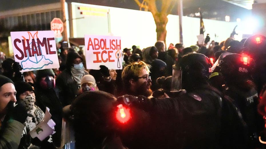 Portland agitators clash with police after 2 shot by federal immigration agent