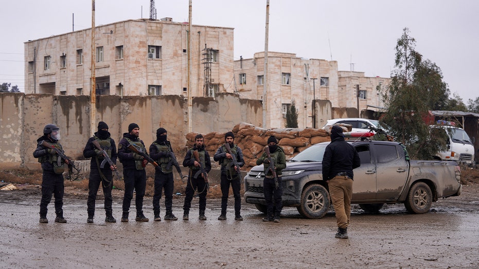 Chaos in Syria sparks fears of ISIS prison breaks as US rushes detainees to Iraq