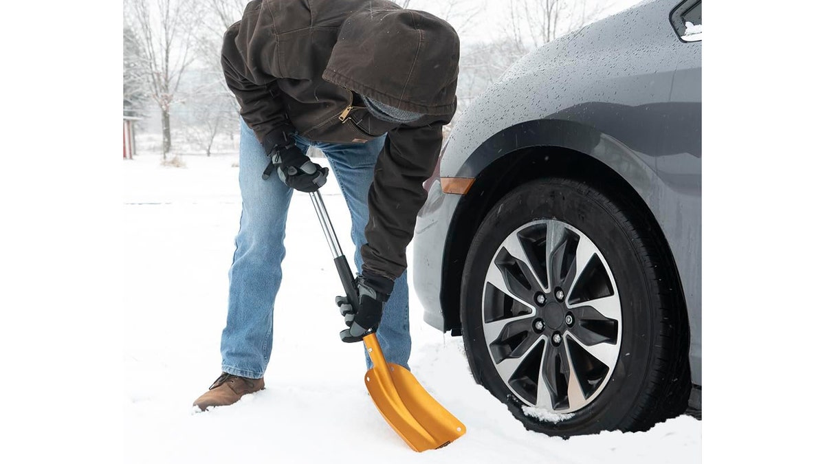 Dig yourself out of snowbanks with a foldable shovel. 