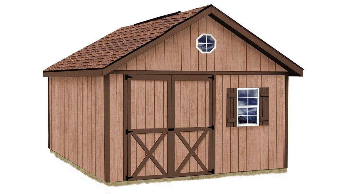 A cottage-style cabin with multiple windows and large doors. 