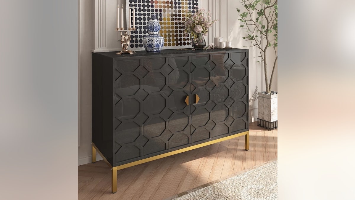 Hide clutter in style with this modern accent cabinet.