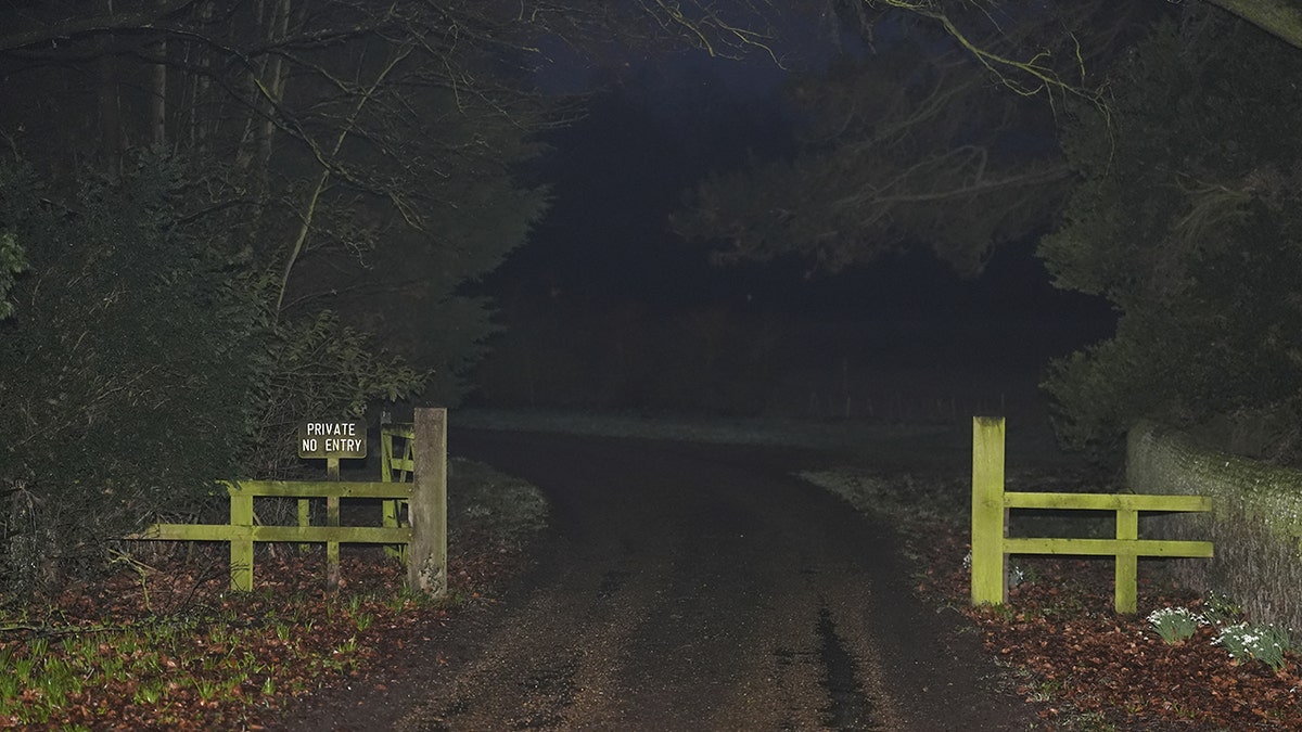 The entrance to the Sandringham estate at night.