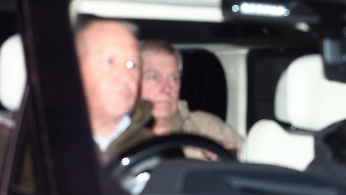 Former Prince Andrew being driven after he was released following his arrest.